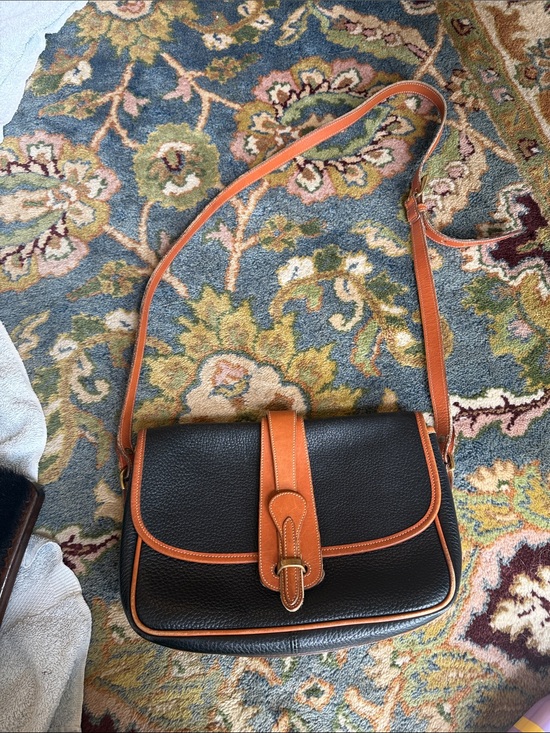 Dooney & Bourke Handbags - Dooney & Bourke Black with Tan Trim Pebbled Leather Crossbody